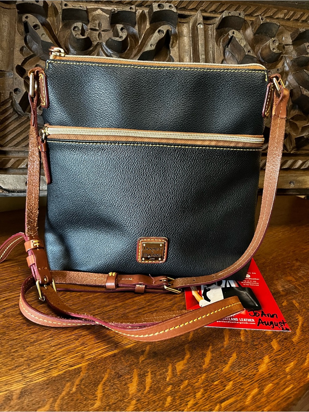 Dooney & Bourke Black Pebbled Leather Letter Carrier Crossbody Bag